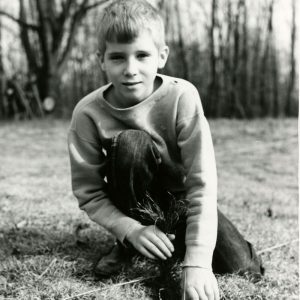 00-00-0000 Boy planting a pine seedling-website