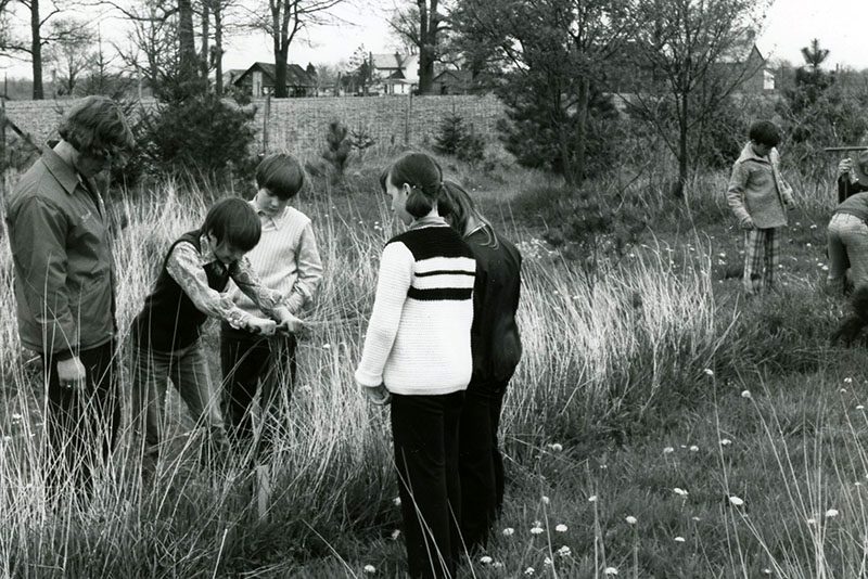 A group of young people planting trees
Photo ID#: E98