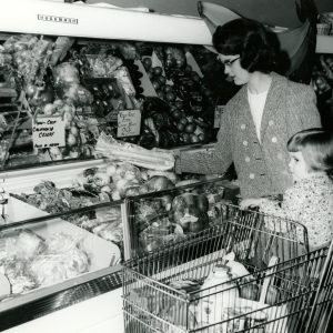 01-27-1965 Adrian Achtermann, Millersburg,Ohio, selecting vegetables. Holmes SWCD-0001