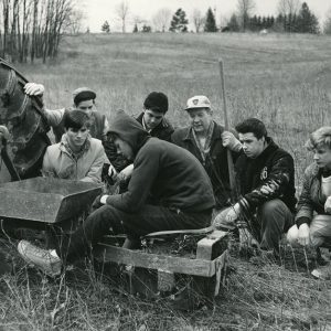 04-09-1966 Al Kretz (on planter), Rusty Locke as they use the District tree planter for 18,000 white pine at Woods & Water Christian Retreat-website
