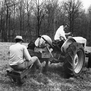 04-12-1964 Edward Adams, Richard Adams (on tractor) using SWCD tree planter-website