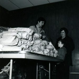04-19-1975 Jeff Van Loon, Mrs. Hershel Bugg, Tracy Bugg (boy) Richland SWCD WP Tree Pick-up-website