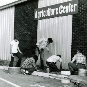 05-14-1975 Senior 4-H members assist in completing the Ag Center ornamental planting project. Agent Seymour supervises-website