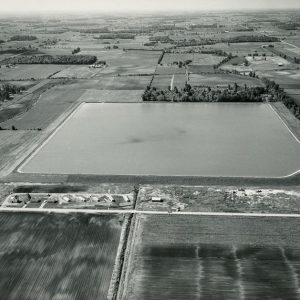 06-15-1966 Aerial view of the 73 acre irrigation reservoir in the Marsh Run Project used for irrigating vegetable crops-website