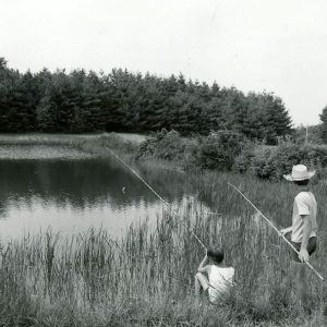 07-15-1975 Fishing in a pond at Richland Rural Life Center