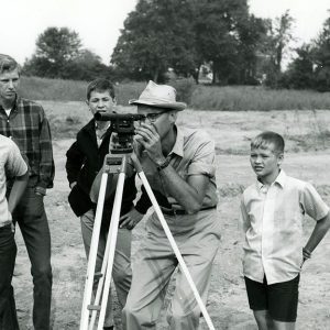 08-19-1967 Dean Swigart at Verne Flaugher Farm with Howard Stone & his 4-H club checking out a pond-website