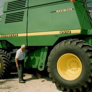 2004 Ken Adams looking at equipment-website