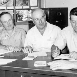 Five Men sitting at table-0004.Photo by Robert Mills