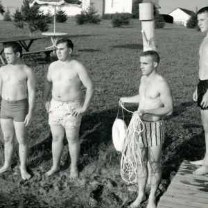 Four young men appear to be practicing water rescue#2-0001