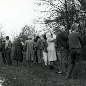 Group of men and women observing trees-0001