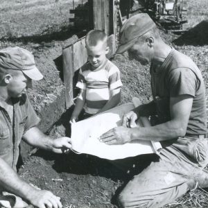 Harold Alt, Keith Alt and Leonard Krietemeyer studying a blur print. Photo by Robert Mills