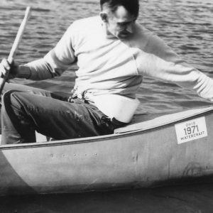 Man in canoe.Photo by Robert Mills