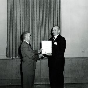 Man making a presentation to an another man-0001