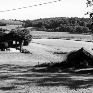 Two buildings on hillside .Photo by Robert Mills