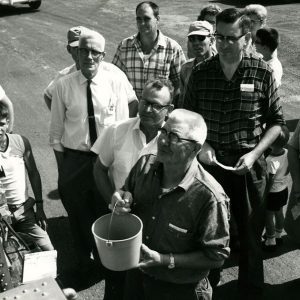 Unidentified group picking up fish-website