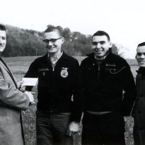William Wareham presenting award to James Fulk, Dennie Lawdon,and Jerry Pfister. Phot o by Robert Mills