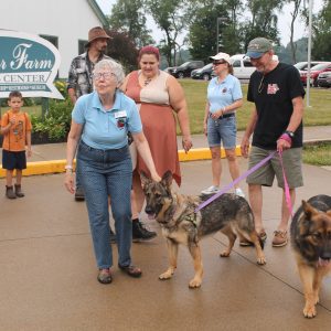 King, Mickie with dogs