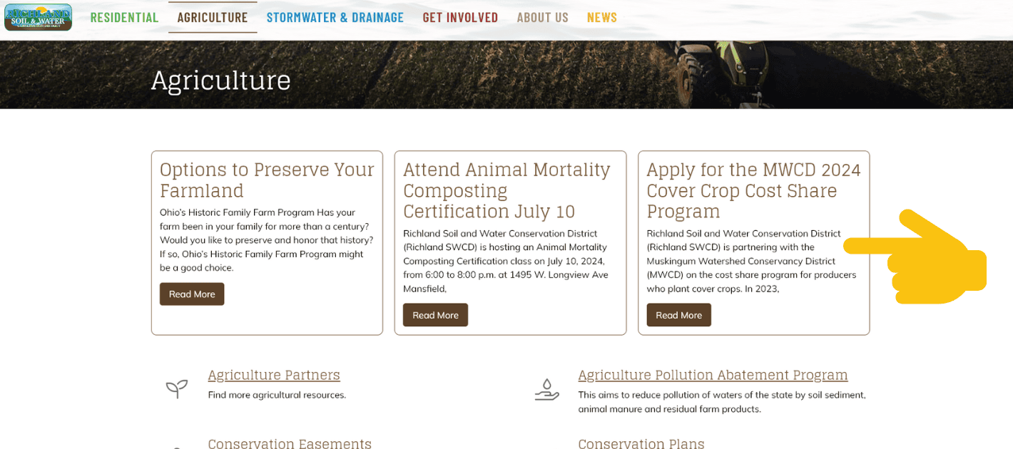 Screenshot of Richland SWCD website with a hand pointing to the agricultural articles. 