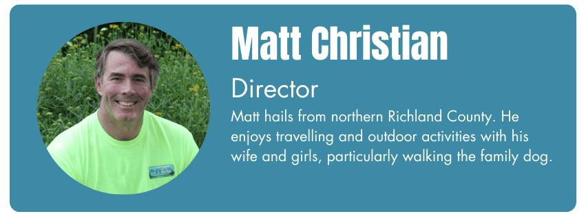 Photo of Matt Christian, Director. His bio reads "Matt hails from northern Richland County. He enjoys traveling and outdoor activities with his wife and girls, particularly walking the family dog."