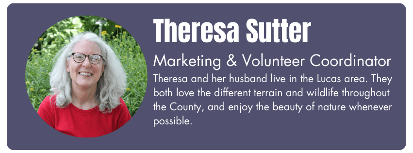 Photo of Theresa Sutter, Marketing & Volunteer Coordination. Her bio reads "Theresa and her husband live in the Lucas area. They both love the different terrain and wildlife throughout the County, and enjoy the beauty of nature whenever possible."