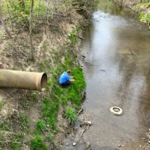 Matt, SWCD Technician, Taking Upstream Control Sample as Part of the Pollution Abatement Program April 2023
