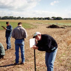 County_Land_Judging._2_females___4_males_in_field_making_observations