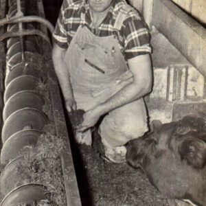 Farmer with a cow