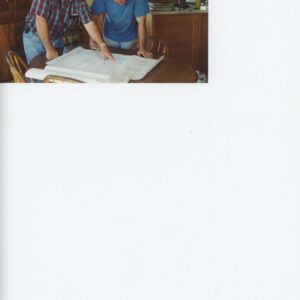 Gary Mathes and Tom Miller Looking at Plans for an Animal Waste Composte Building