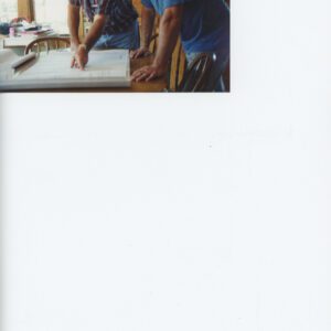 Gary Mathes and Tom Miller Looking at Plans for an Animal Waste Composte Are