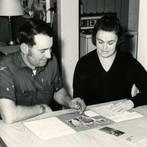 February 6, 1973. Mr. and Mrs. Tom Kranz examine the conservation plans which Tom uses on his farm