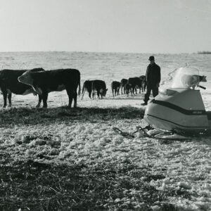 February 16, 1970. Ralph Winters with his snowmobile.
