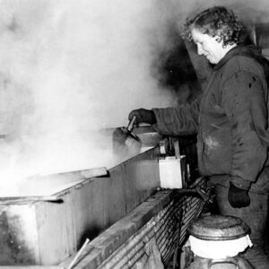 March 2, 1974 Mrs. Howard Isley shown in the Isley sugar house as she skims the boiling sap