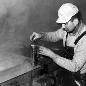 March 30, 1965 Dave Culler checking temperature for maple syrup