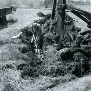 April 19, 1967 John Phillips Installing Drain Tile at Chester Hampton’s Farm