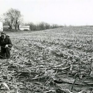 April 30, 1980 Ken Ernst checking the soil temperature in a no-till corn field