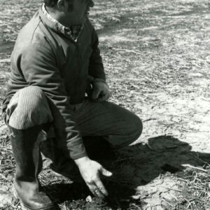 May 12, 1981 Darrell Kissell checks the no-till soil conditions at Kissell Farms in Weller Township