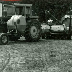 June 1980 Loading fertilizer into a planter at the Darrel Kessel Farm