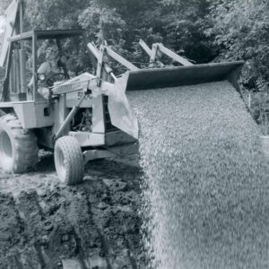 June 1981 Gravel Being Dumped on a Rock-Lined Waterway Being Installed by Doug Smith on the Donnersbach Farm