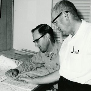 06_25_1969_Dean_Swigart___Carroll_Dunfrey__ODNR__are_shown_as_they_check_out_farm_drainage_outlet_needs_for_the_proposed_U.S._30_N_by_pass_for_Crestline_website-3136