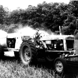 June 26, 1971 John Swartz spraying onions.