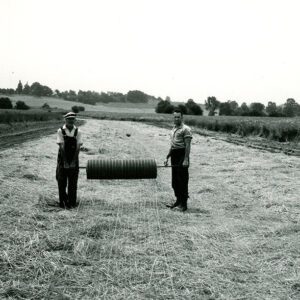 July 25, 1967 Sod Waterway on Bryan King Farm. Bryan King and Charles Coleman Installing Mulch Netting
