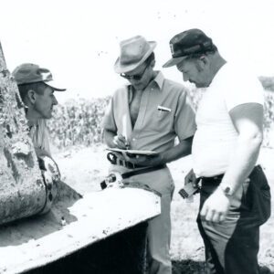 July 30, 1975. Ivan Ulmer, Dean Swigart, Dwayne Slessman discuss cuts.
