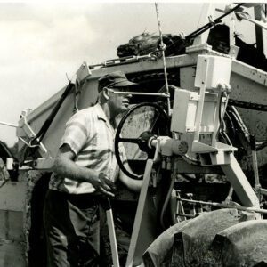 July 30, 1976 Franklin Young is Shown as He Installed Tile Tubing at the Donald Shawk Farm. It was a Systematic Job.