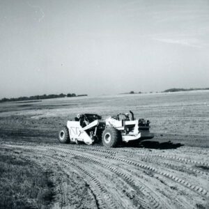 August 4, 1976 Beck Grauer Grassed Waterway, Frank Eberl on a pan scraper