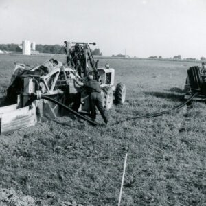 August 18, 1970 Roger Follen Installing Drainage Tile at the Forbes Farm