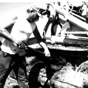 August 27, 1975 Blake Kirsch Performing Bulldozer Maintenance at the K. Beck Farm