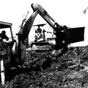 August 27, 1975 Romie Bond on the Backhoe and Blake Kirsch on the Bulldozer Putting in Rip-Rap at the K. Beck Farm