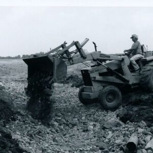 September 5, 1980 A contractor on a back hoe shaping sides on S. Carpenter’s Waterway