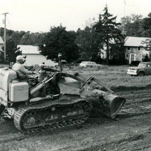 September 19, 1969 Carl Culler Farm. Blake Kirsch Constructing a Diversion to Protect Buildings