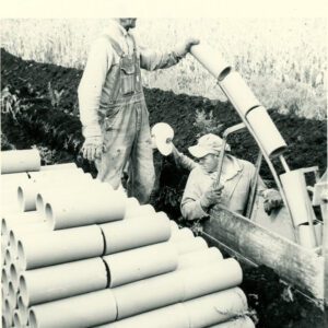 September 25, 1965 Raymond Vonsteid Laying Drainage Tile. Tile Drainage